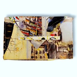 ❤️ Artsy & rustic clutch from Anthropologie